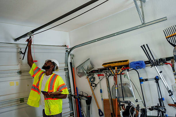 Professional Garage Door Panel Replacement technician working in Hinton, OK